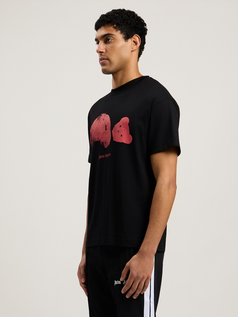 camiseta con oso roto en aerosol