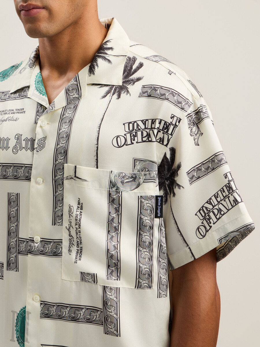 camisa de manga corta con estampado de dólares
