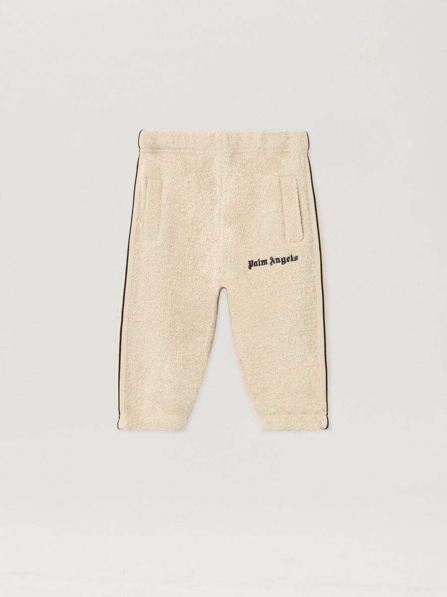 pantalones deportivos con logo de peluche