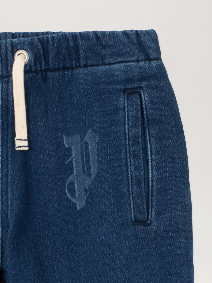 pantalones vaqueros anchos lavados con letras